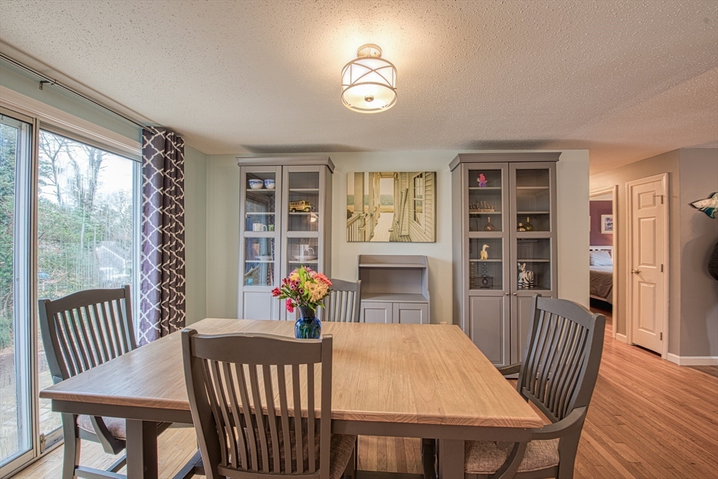 38 Cap'n Jac's Road Barnstable, MA 02632 - Photo 6 of 18 a view of a dining room with furniture window and wooden floor