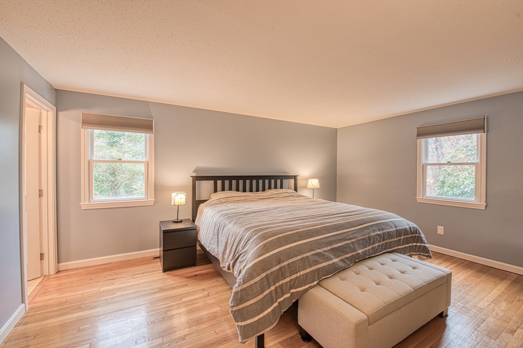 38 Cap'n Jac's Road Barnstable, MA 02632 - Photo 9 of 18 a bedroom with a bed and wooden floor