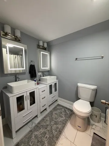 a white stove top oven and sink