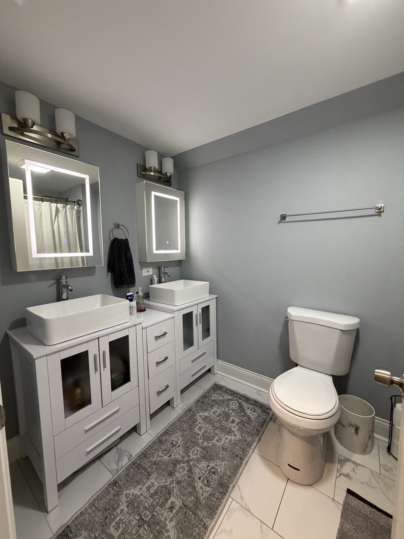 473 East Elm Street Sycamore, IL 60178 - Photo 14 of 21 a white stove top oven and sink