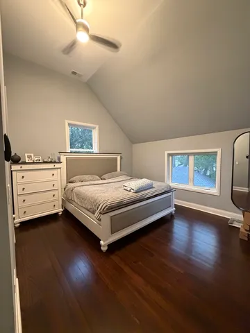 a bathroom with a sink toilet and mirror
