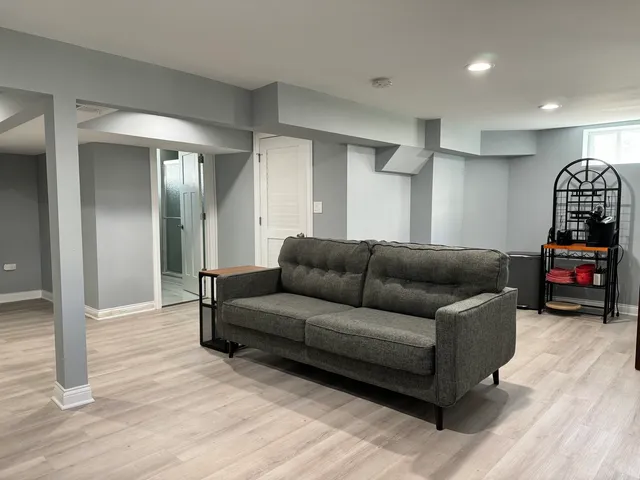 a bedroom with a bed and a table