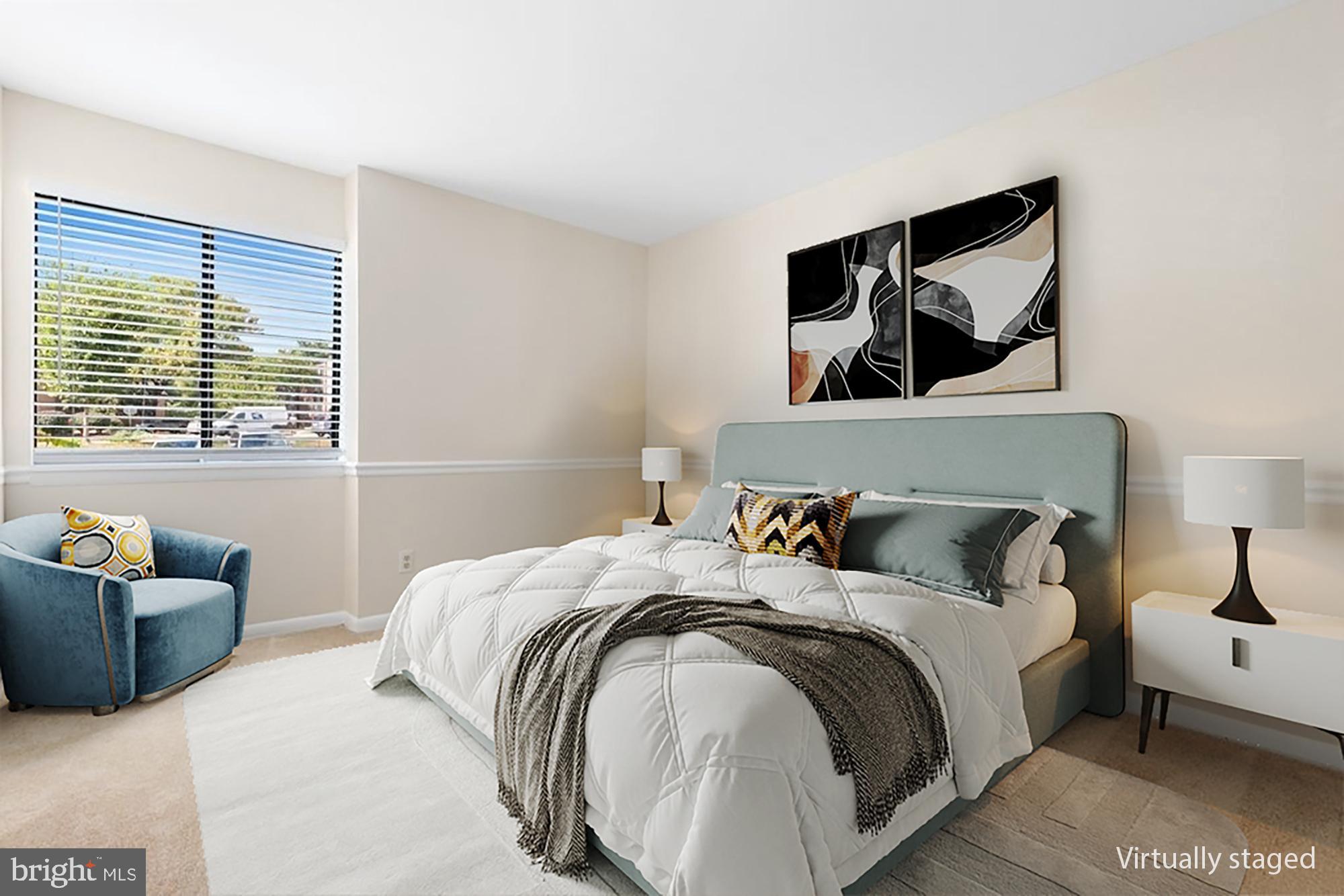 19027 Mills Choice Road, Unit 4 Gaithersburg, MD 20886 - Photo 15 of 26 a bedroom with a bed and furniture with window