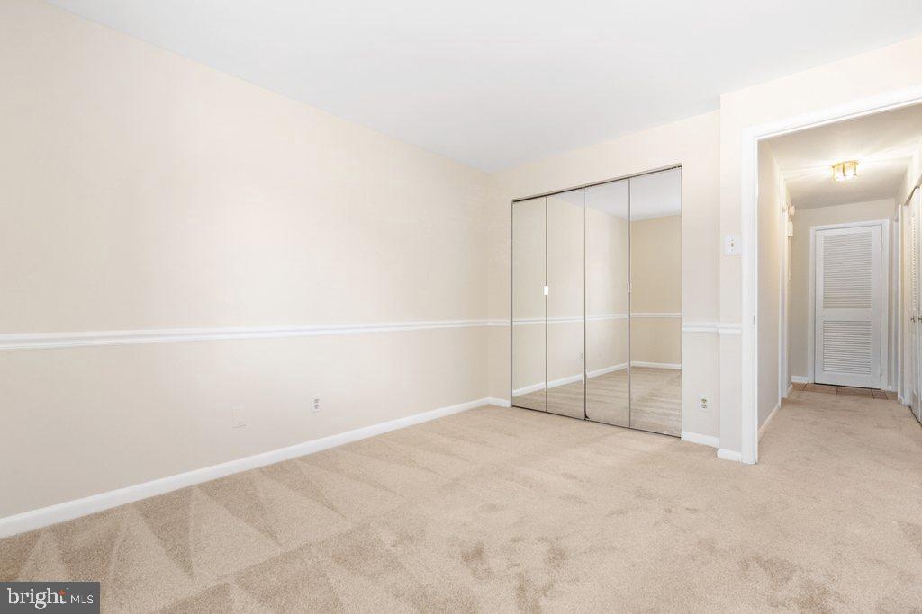 19027 Mills Choice Road, Unit 4 Gaithersburg, MD 20886 - Photo 16 of 26 an empty room with an empty space