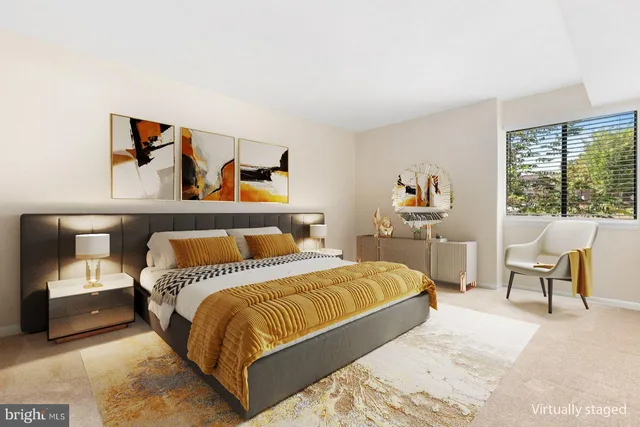 a bedroom with a bed and a chair