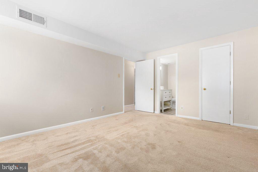 19027 Mills Choice Road, Unit 4 Gaithersburg, MD 20886 - Photo 20 of 26 a view of an empty room