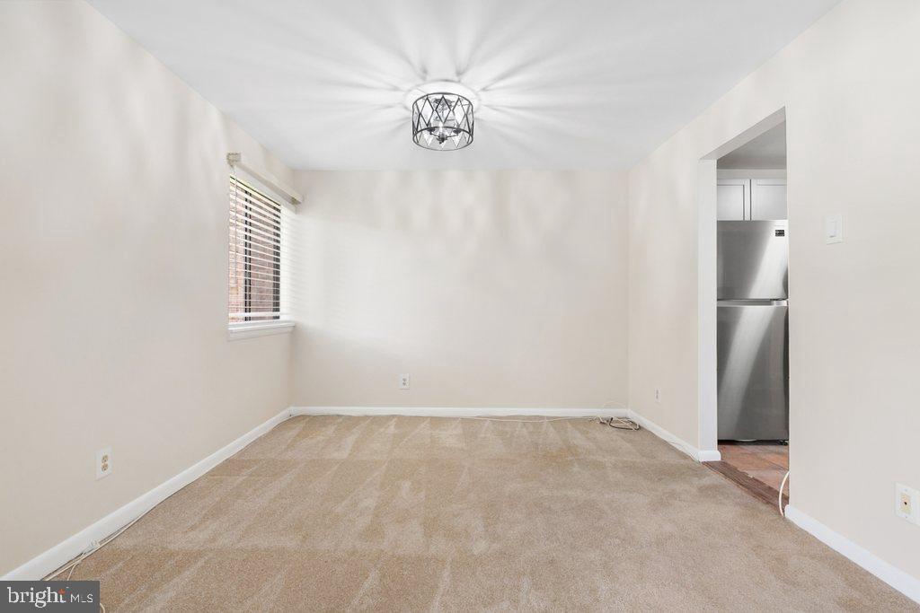 19027 Mills Choice Road, Unit 4 Gaithersburg, MD 20886 - Photo 7 of 26 a view of empty room with window