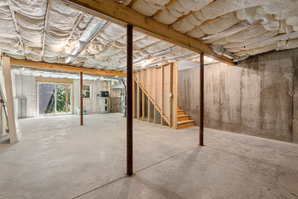 26 Brookview Lane, Unit 26 Mendon, MA 01756 - Photo 18 of 23 a view of an empty room with a window