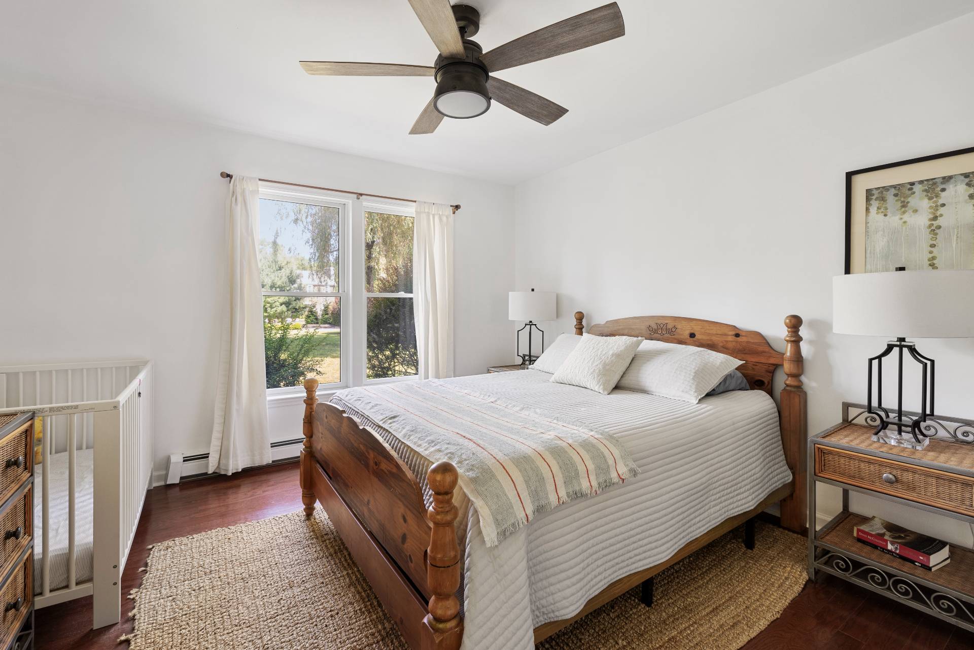 312 Noyack Road Southampton, NY 11968 - Photo 14 of 18 a bedroom with bed and a window