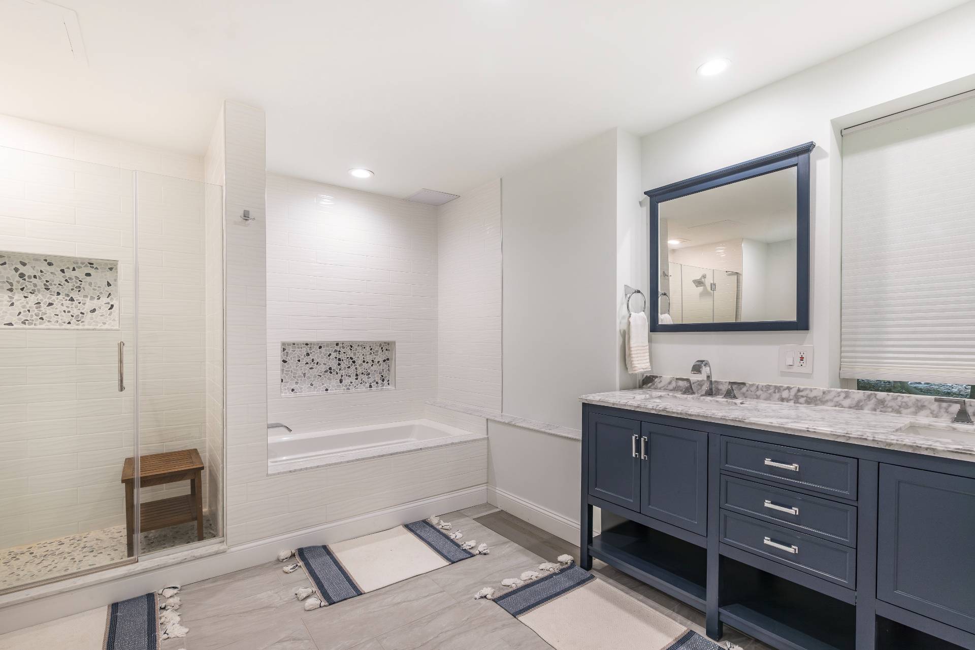 312 Noyack Road Southampton, NY 11968 - Photo 18 of 18 a bathroom with a toilet sink and mirror