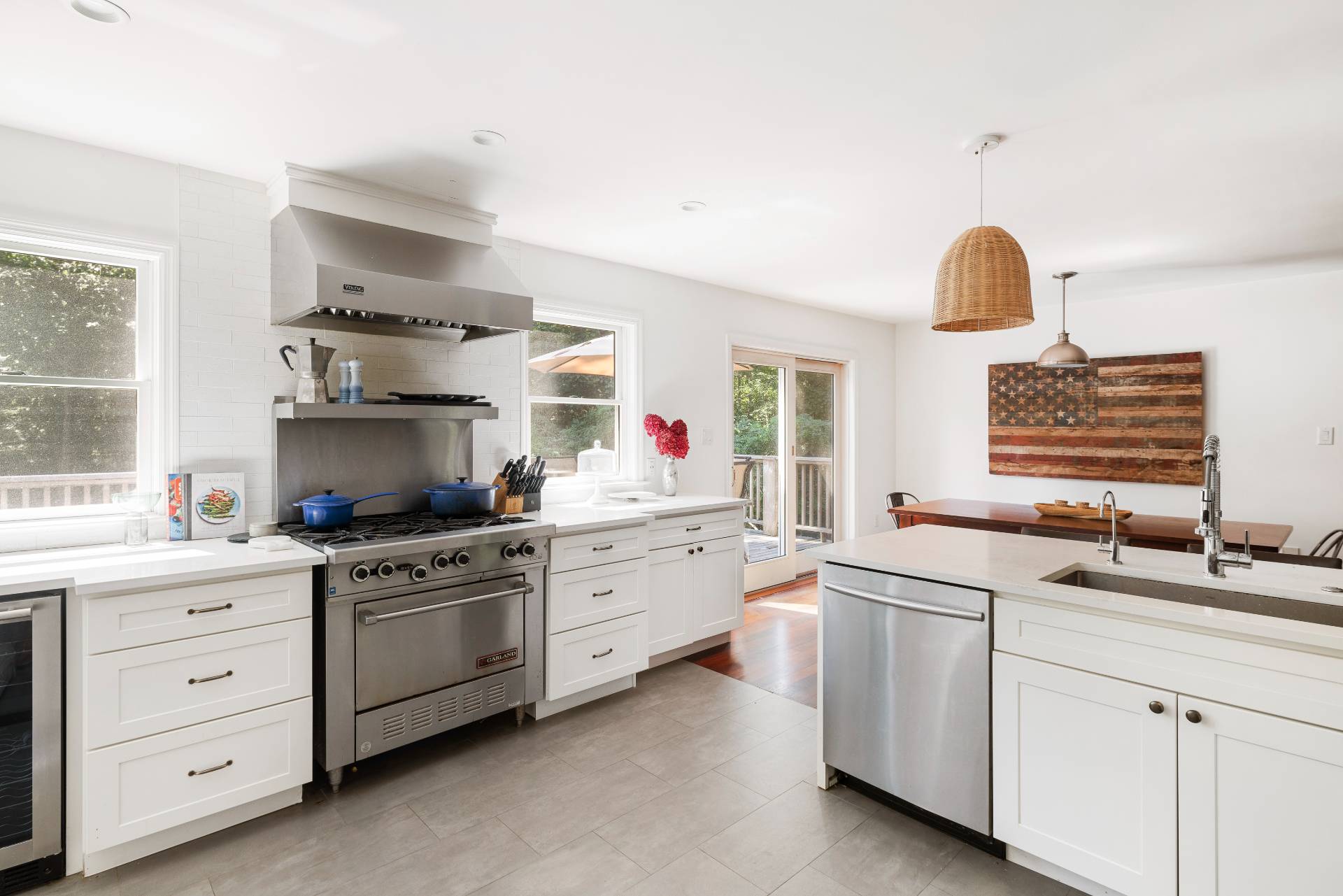 312 Noyack Road Southampton, NY 11968 - Photo 7 of 18 a kitchen that has a sink and a stove