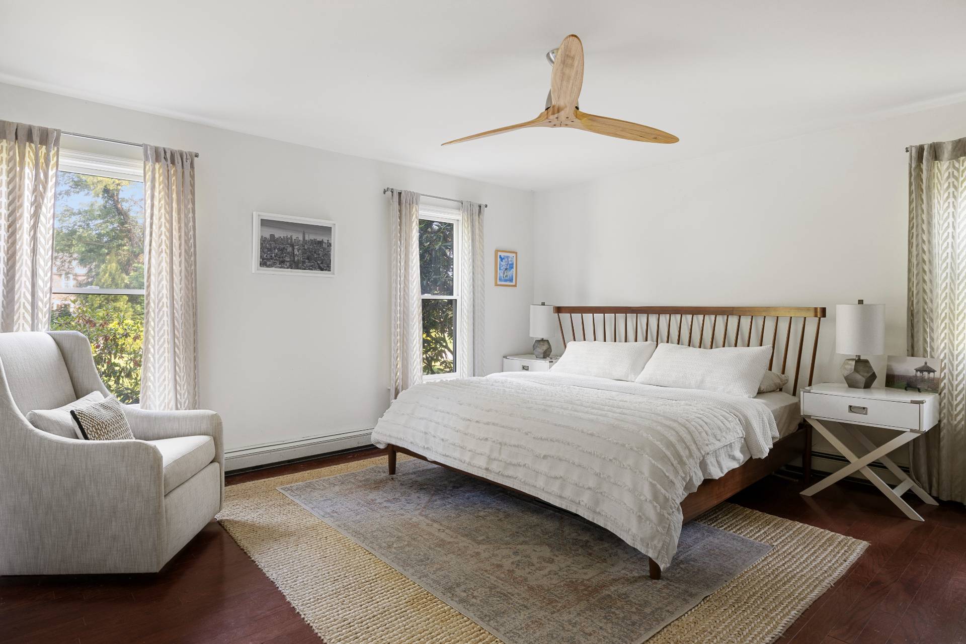 312 Noyack Road Southampton, NY 11968 - Photo 10 of 18 a bedroom with a bed and a couch