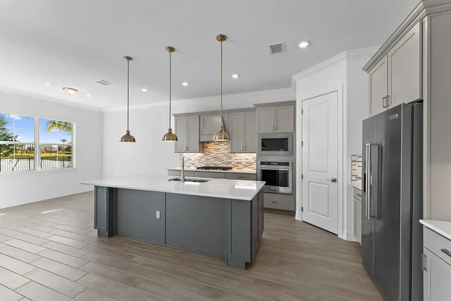 a view of room with wooden floor and window