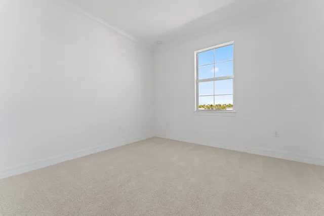 a view of a dining room with furniture wooden floor and chandelier