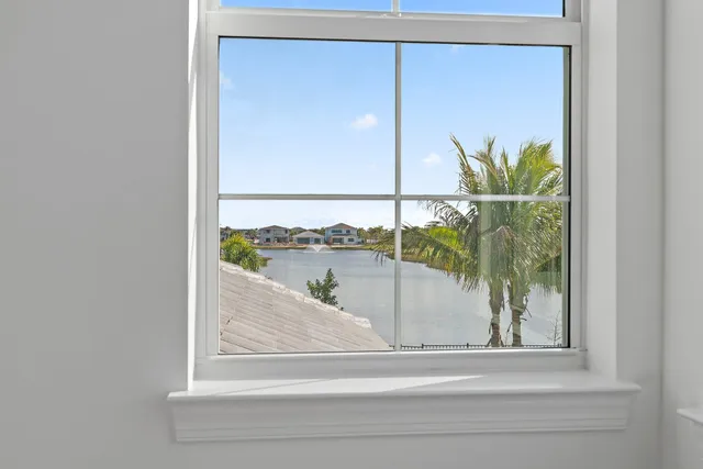 a view of a patio with a table and chairs