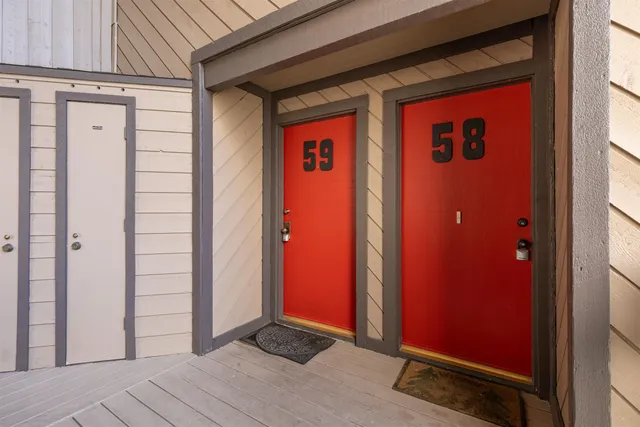 a sign board on the side of a road