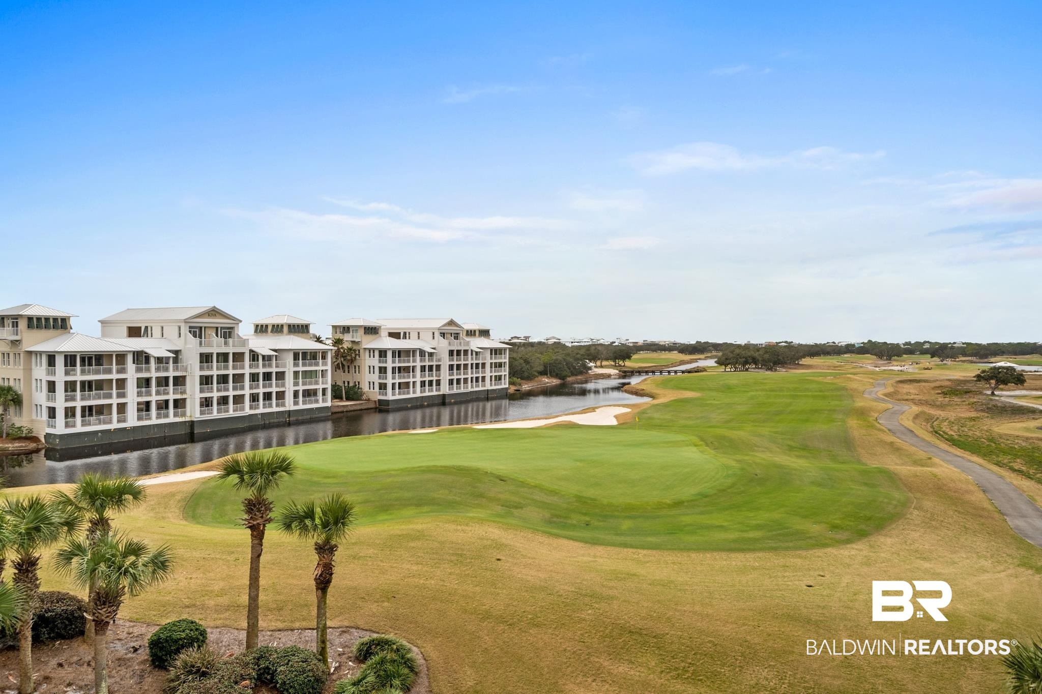 815 Plantation Road, Unit 405 Gulf Shores, AL 36542 - Photo 23 of 39 View of home's community with a lawn and a water view