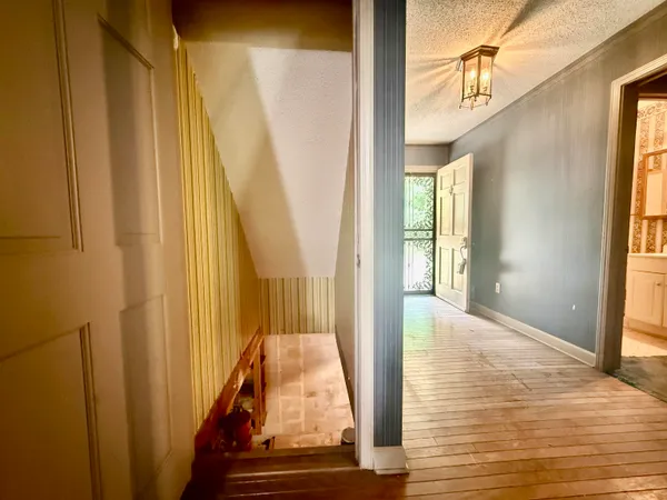 a house with trees in front of it