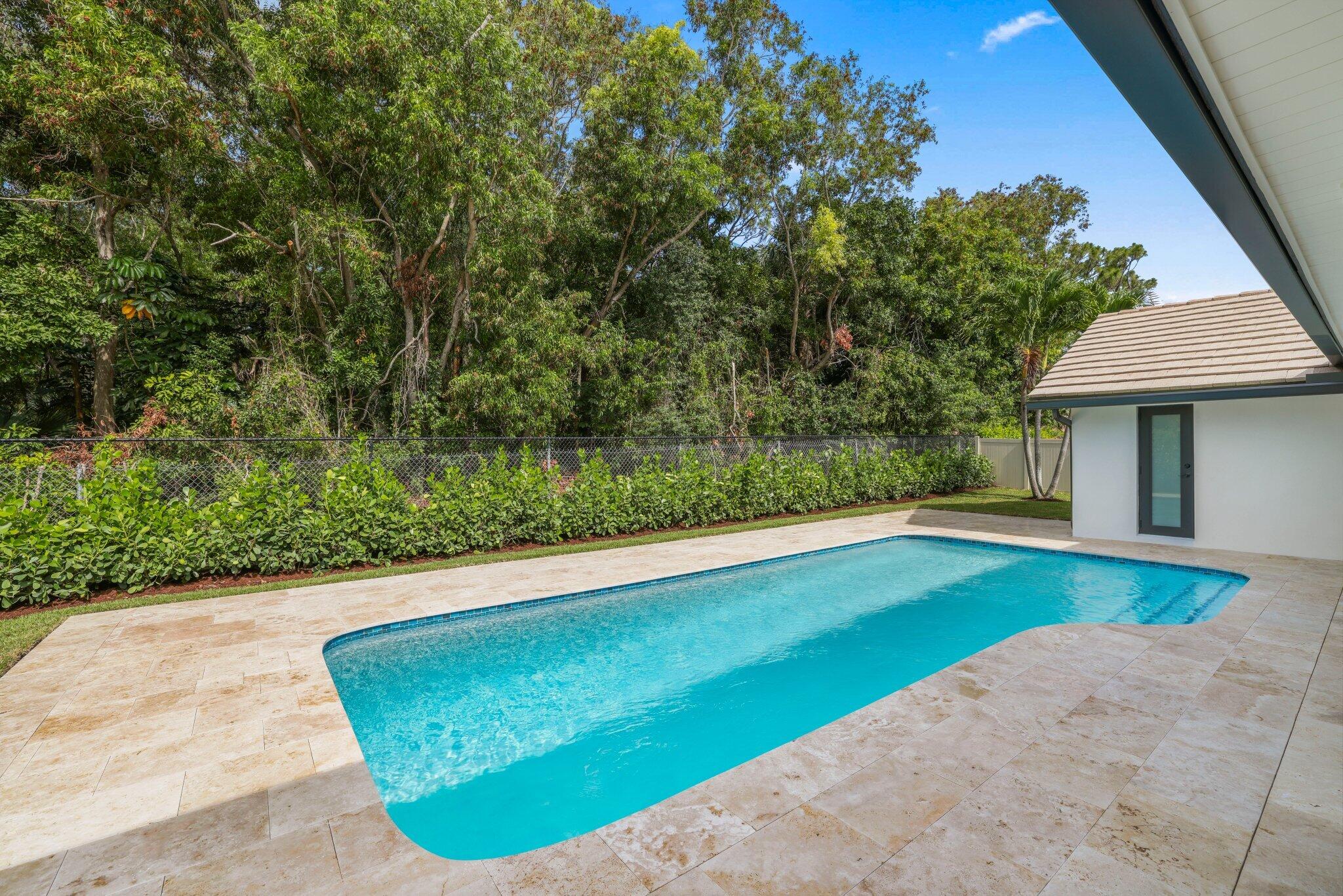 3901 Northwest 27th Avenue Boca Raton, FL 33434 - Photo 49 of 56 a view of swimming pool with a backyard