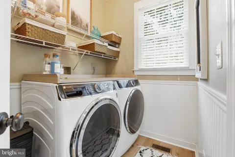 a utility room with dryer and washer