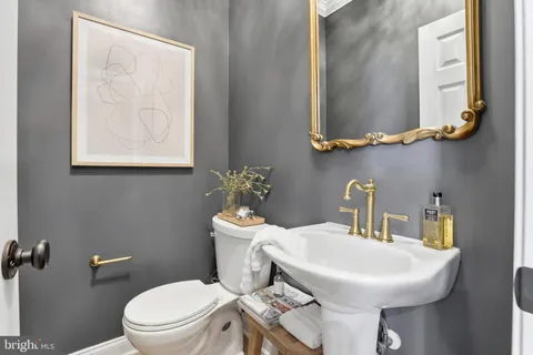 a view of a hallway with window and stairs