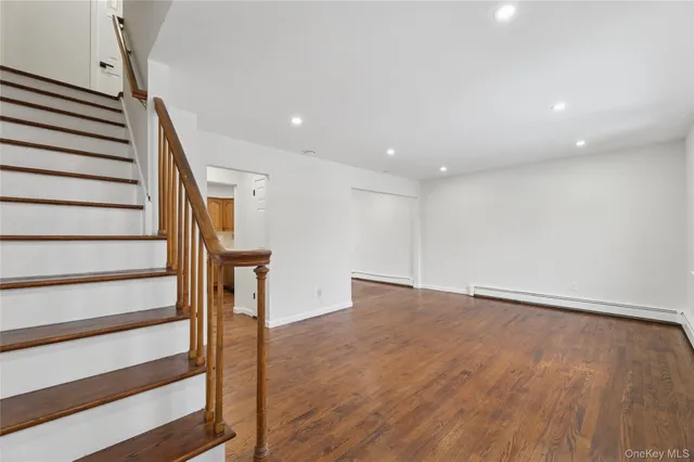 a view of entryway with wooden floor