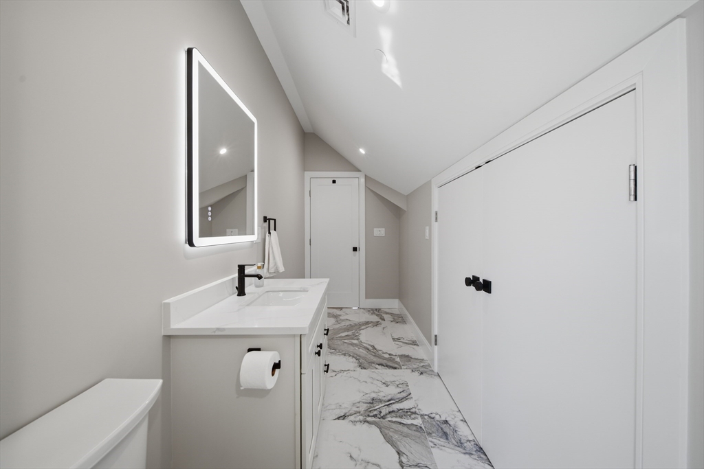 174 Walnut Street, Unit 3 Somerville, MA 02145 - Photo 16 of 38 a bathroom with a sink toilet and shower