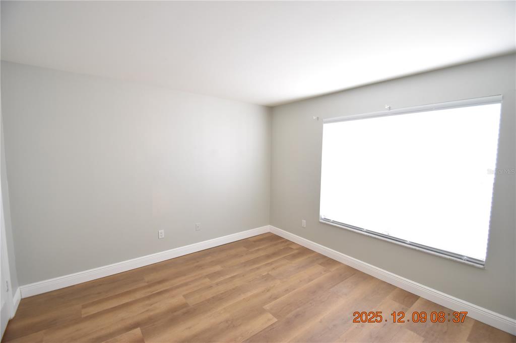 3402 Latania Drive, Unit 316 Tampa, FL 33618 - Photo 15 of 36 an empty room with a window