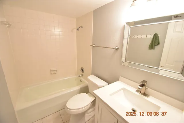 a bathroom with a sink a toilet and a bathtub