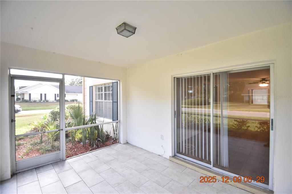3402 Latania Drive, Unit 316 Tampa, FL 33618 - Photo 23 of 36 a view of a room with sliding glass door and glass door
