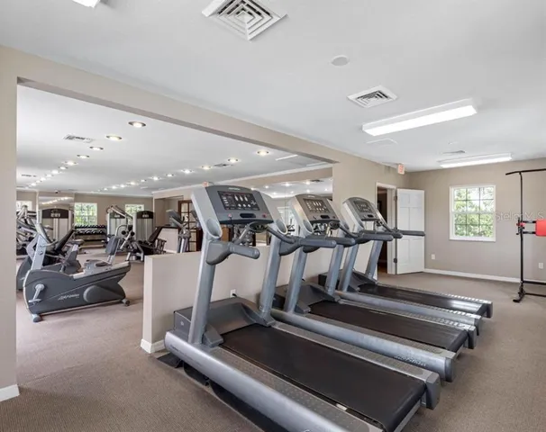 a view of a room with gym equipment