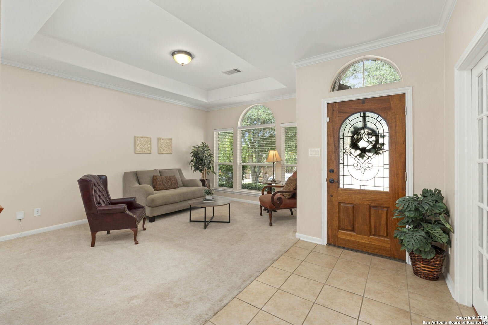16106 Ponderosa Pth Helotes, TX 78023 - Photo 13 of 40 a living room with furniture and a large window