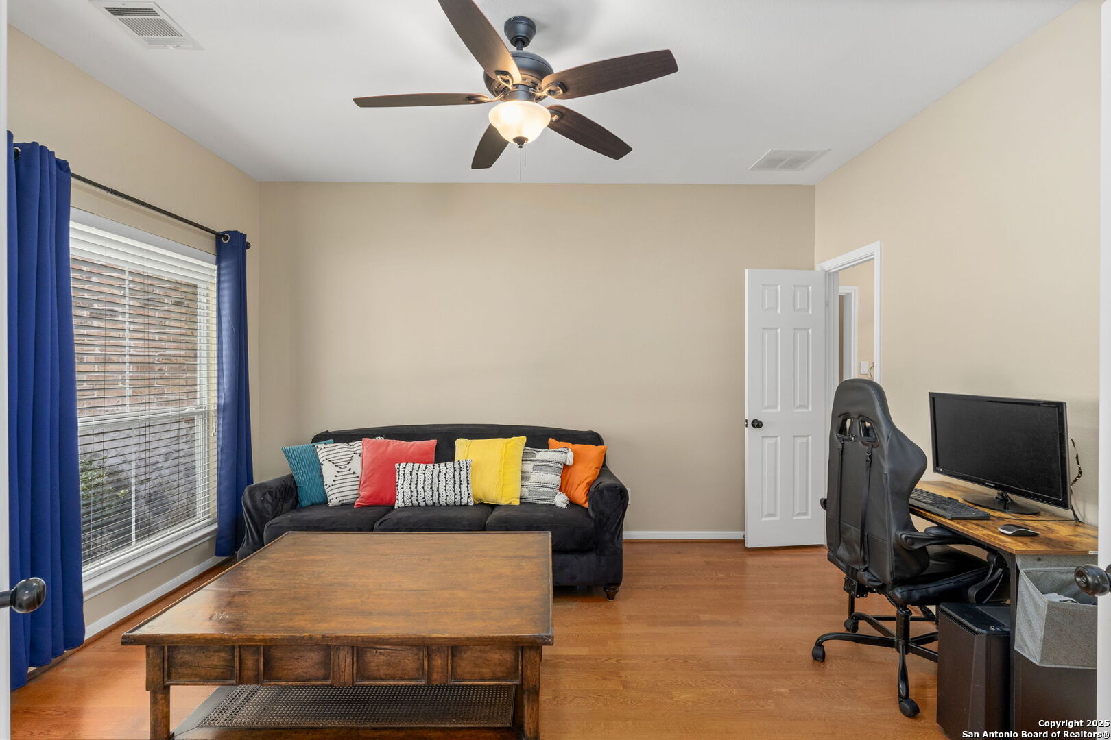 16106 Ponderosa Pth Helotes, TX 78023 - Photo 15 of 40 a living room with furniture and a flat screen tv