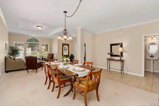a view of a dining room with furniture