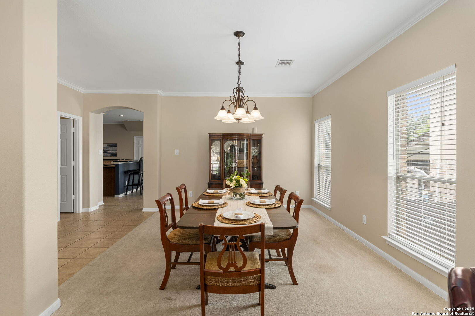 16106 Ponderosa Pth Helotes, TX 78023 - Photo 18 of 40 a dining room with furniture window and wooden floor