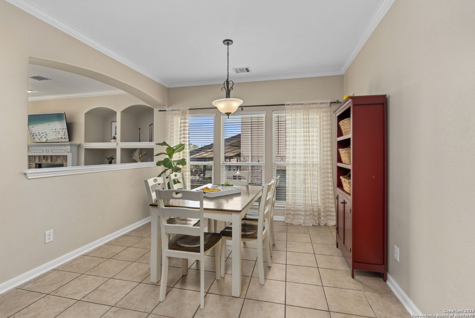 16106 Ponderosa Pth Helotes, TX 78023 - Photo 20 of 40 a dining room with furniture and window