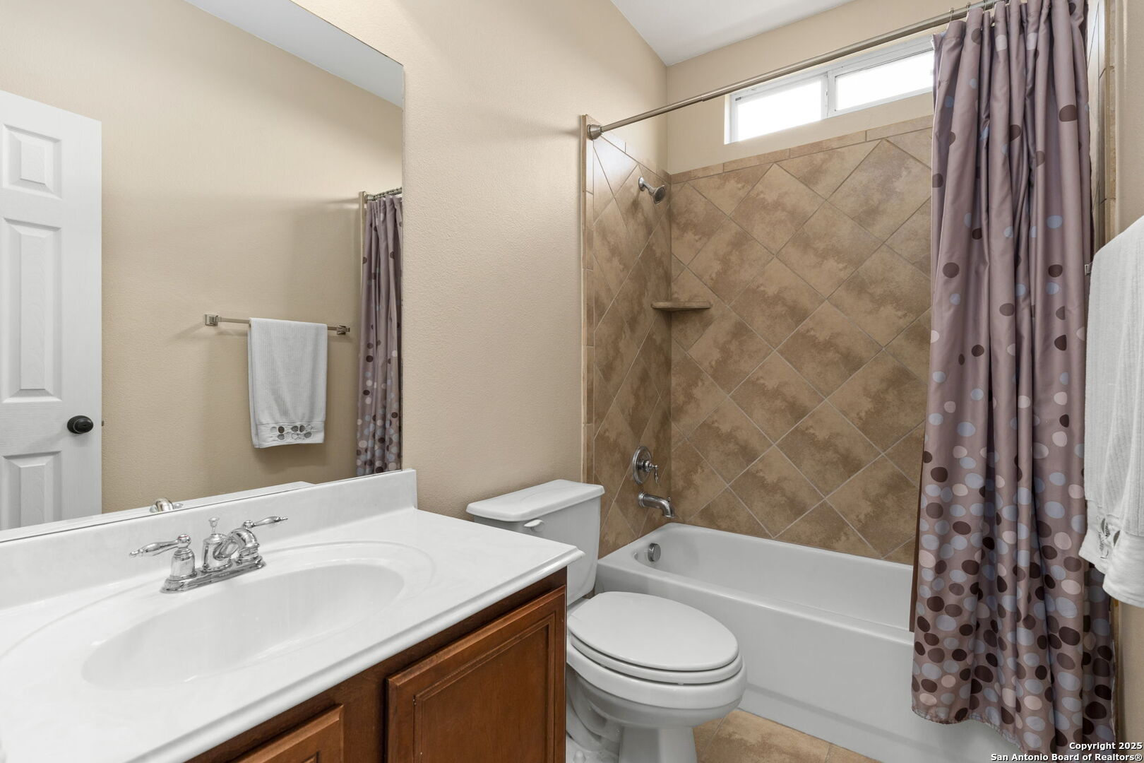 16106 Ponderosa Pth Helotes, TX 78023 - Photo 28 of 40 a bathroom with a sink toilet and shower
