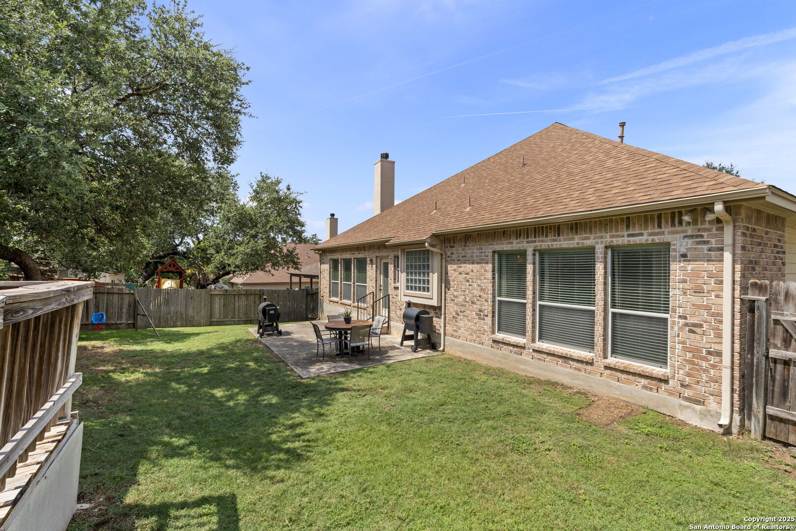 16106 Ponderosa Pth Helotes, TX 78023 - Photo 37 of 40 a view of a house with a yard and sitting area