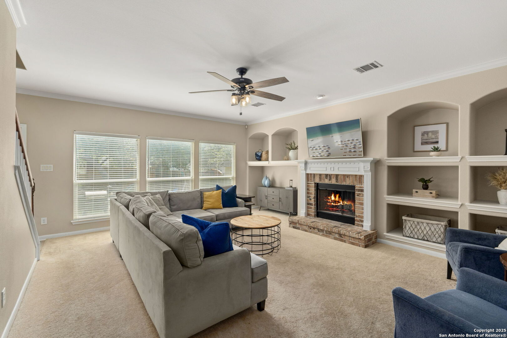 16106 Ponderosa Pth Helotes, TX 78023 - Photo 4 of 40 a living room with furniture and a fireplace