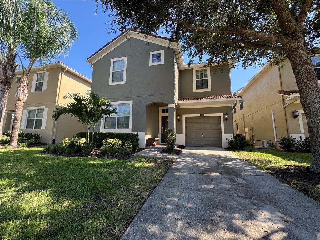 8848 Candy Palm Road Kissimmee, FL 34747 - Photo 2 of 25