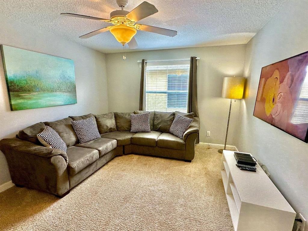 8848 Candy Palm Road Kissimmee, FL 34747 - Photo 9 of 25