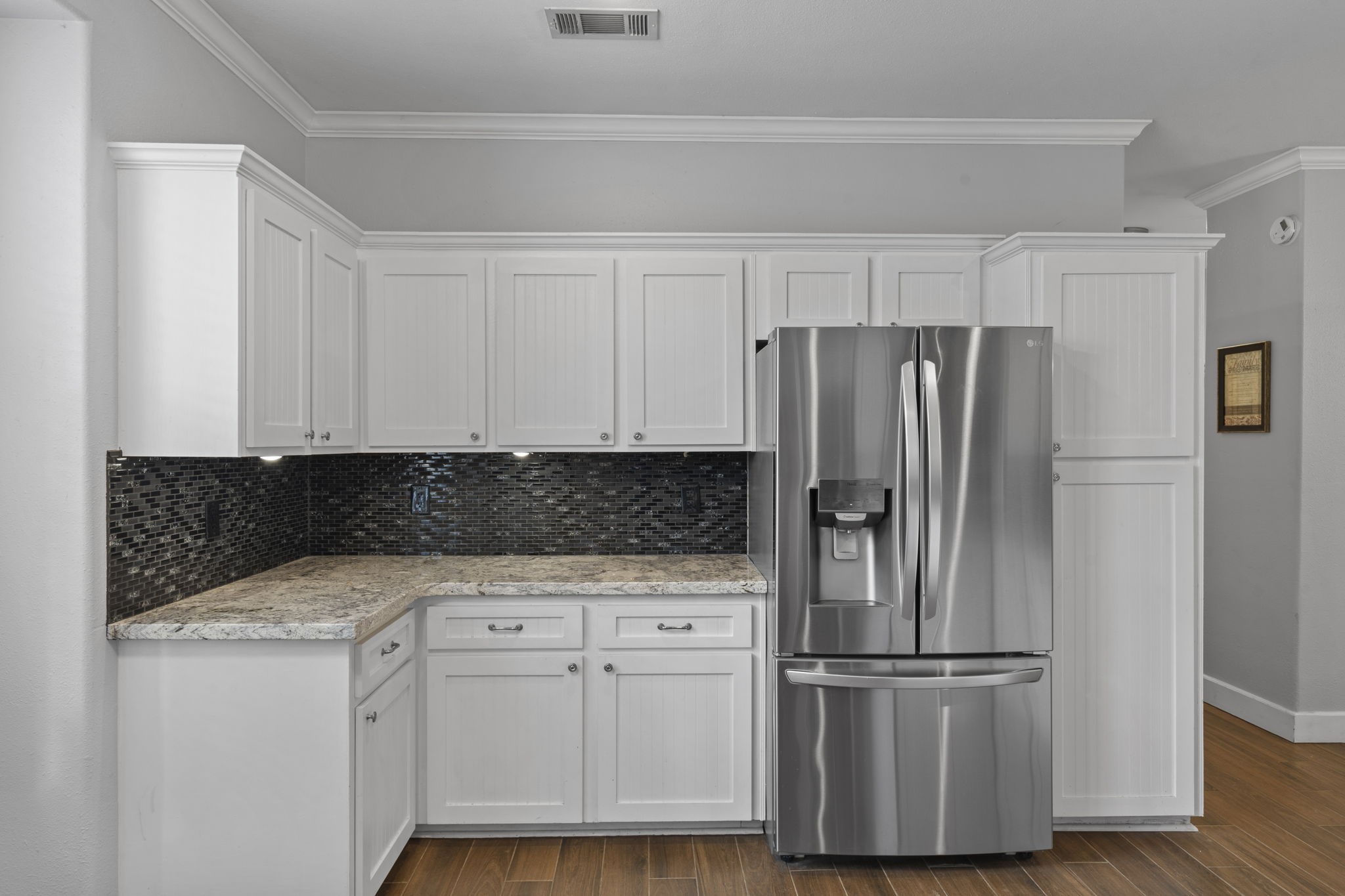 23200 Baneberry Road Magnolia, TX 77355 - Photo 14 of 39 a kitchen with appliances and cabinets