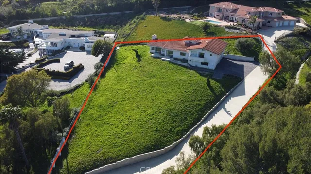 a view of swimming pool from a balcony