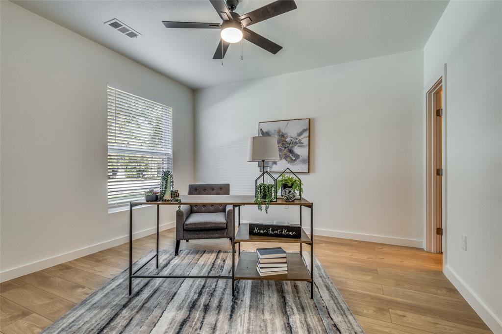 520 South O Connor Road Irving, TX 75060 - Photo 19 of 29 a workspace with wooden floor