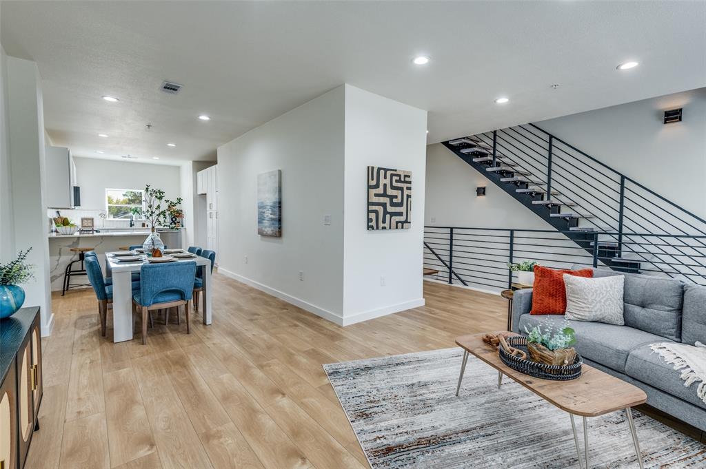 520 South O Connor Road Irving, TX 75060 - Photo 2 of 29 a living room with furniture and wooden floor