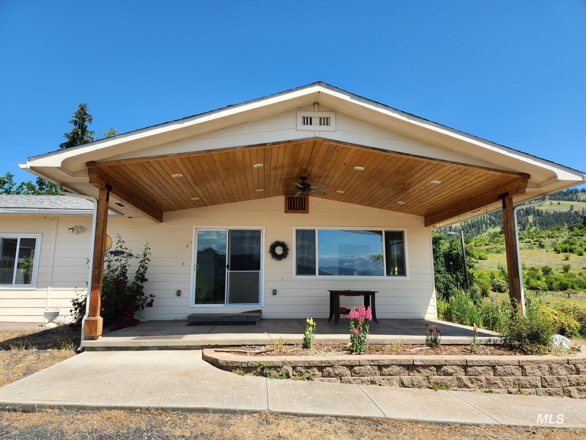 367 Woodland Road Kamiah, ID 83536 - Photo 4 of 45 View of exterior entry featuring covered porch and ceiling fan