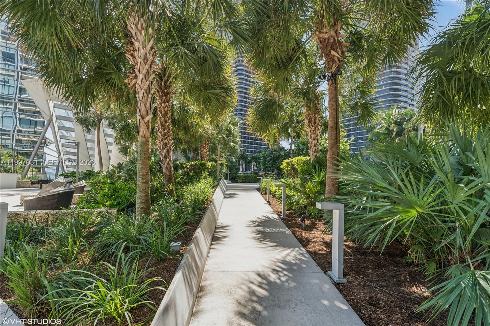 88 Southwest 7th Street, Unit 1804 Miami, FL 33130 - Photo 13 of 39 a view of a potted plants and large trees