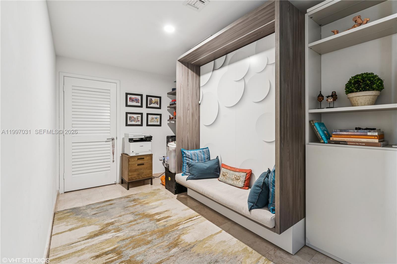 88 Southwest 7th Street, Unit 1804 Miami, FL 33130 - Photo 37 of 39 a bedroom with furniture and a window