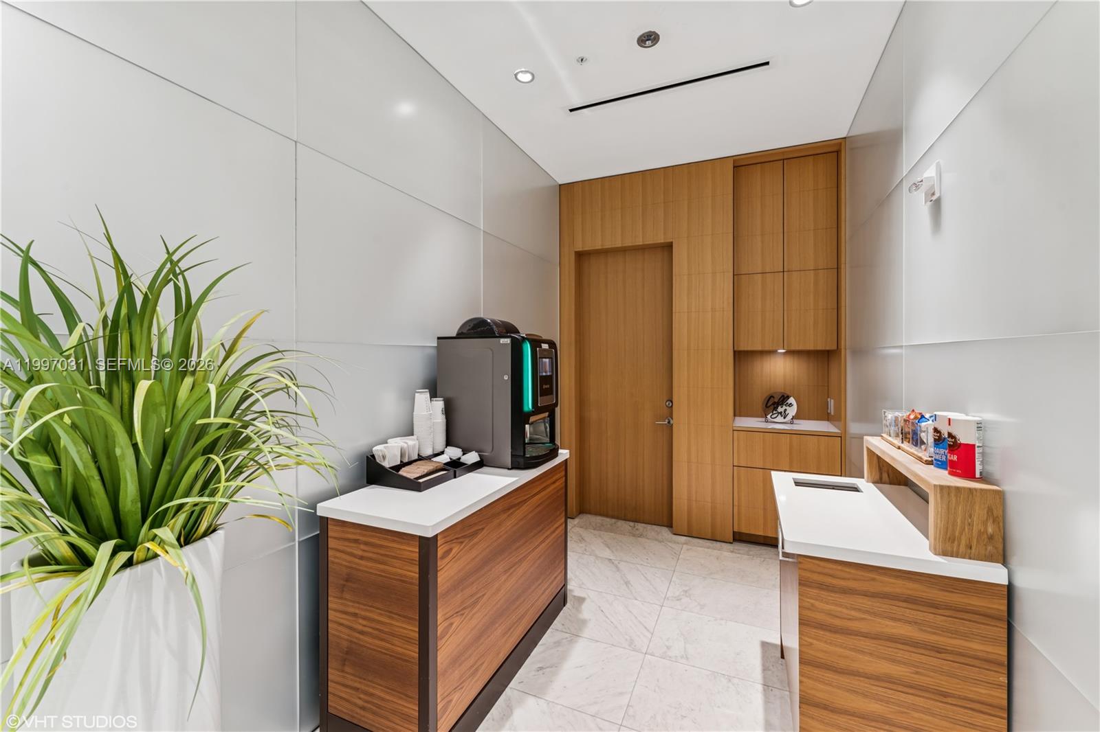 88 Southwest 7th Street, Unit 1804 Miami, FL 33130 - Photo 6 of 39 a room with storage and utility