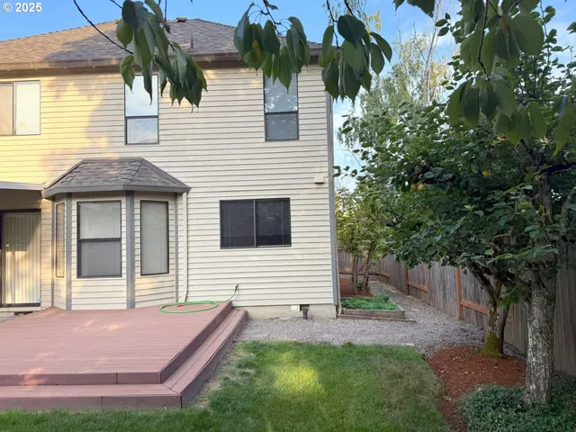 a view of front of house with a yard